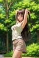 A girl with long brown hair standing in a park.